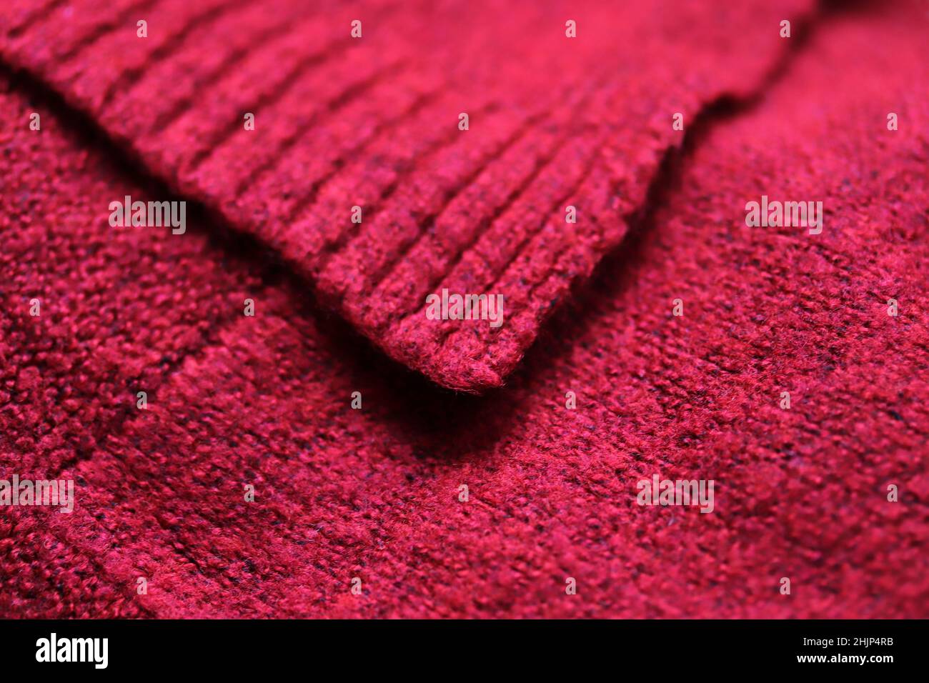 Red wool winter cardigan. Clothes, fashion. Stock Photo