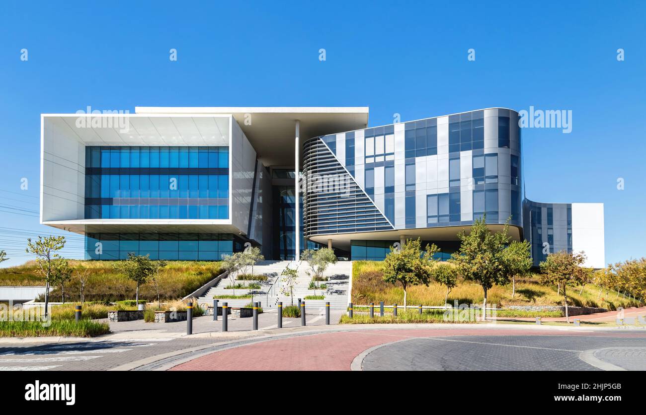 Johannesburg, South Africa, 10th May - 2021: Modern corporate office building with glass facade. Stock Photo