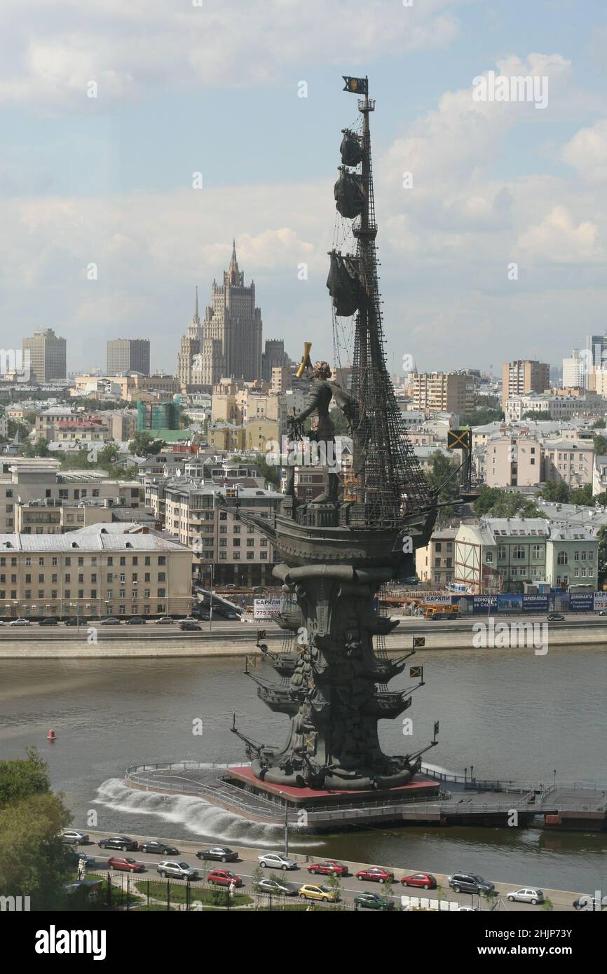 Monument of Russian Tsar, Peter I, on Moskva river and tall Stalinist architecture building of Foreign Affairs (on background) Stock Photo
