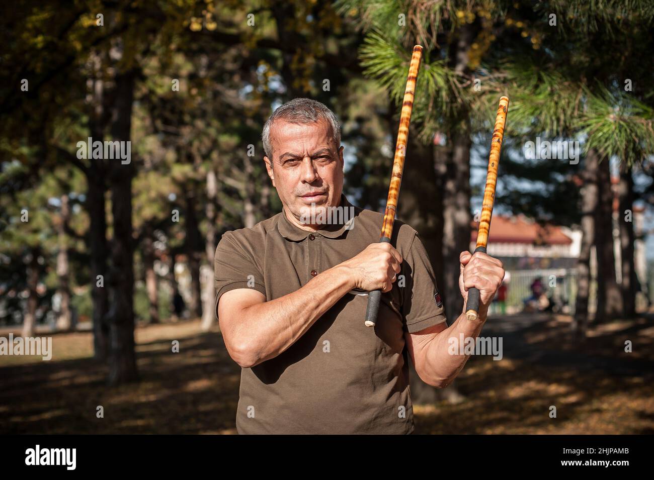 Escrima and kapap instructor demonstrates sticks fighting