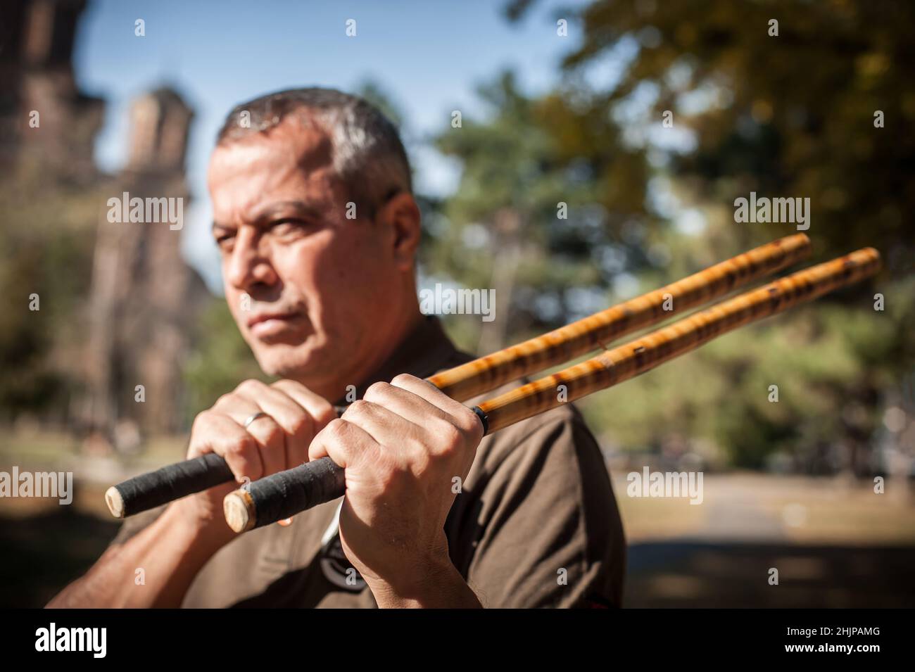 Instructor and student practice filipino escrima stick fighting technique. Martial  arts demonstration Stock Photo - Alamy