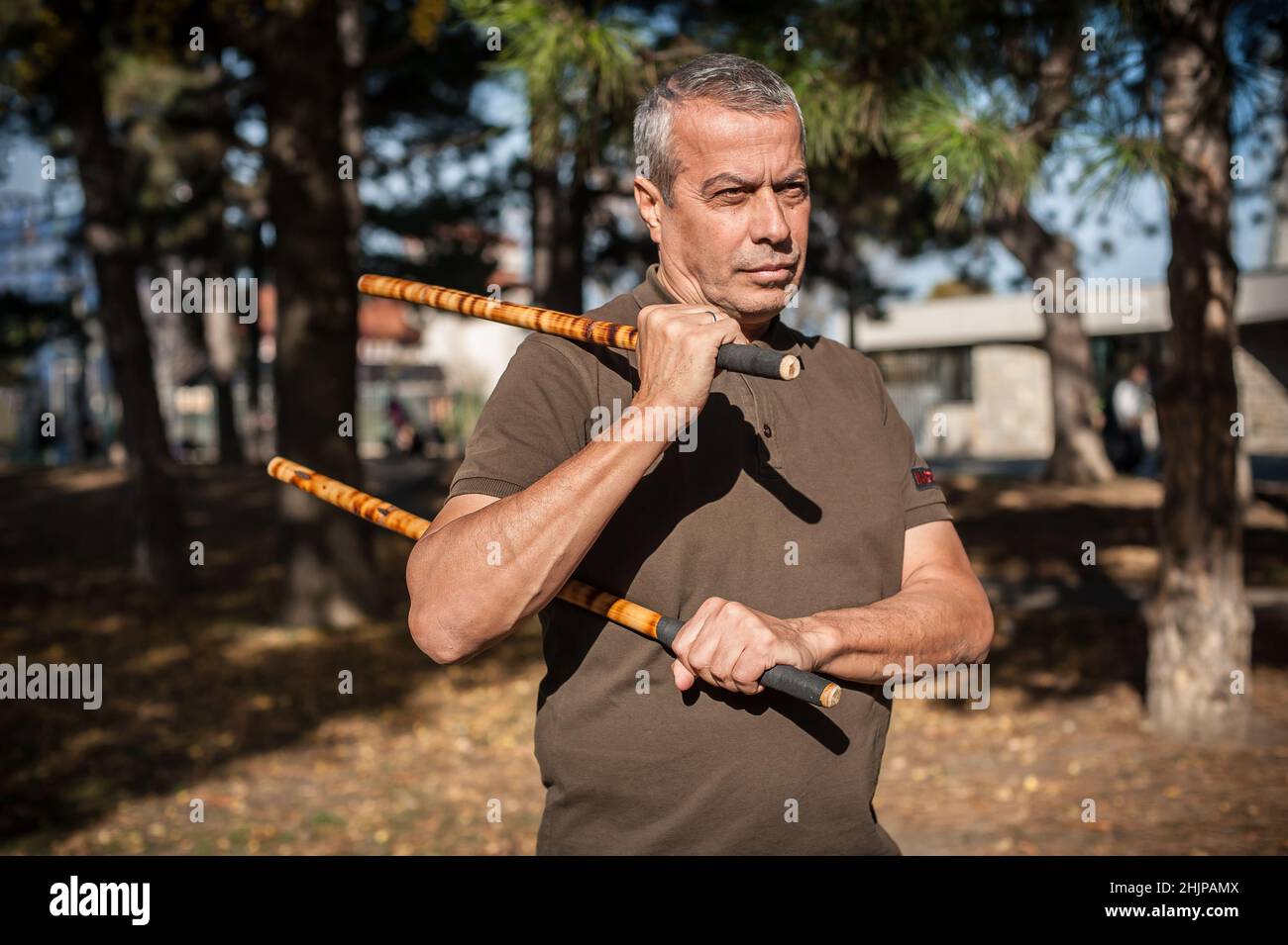 Filipino Martial Arts Instructor Demonstrates Stick Fighting Techniques  Stock Photo - Image of astig, outdoor: 109278684