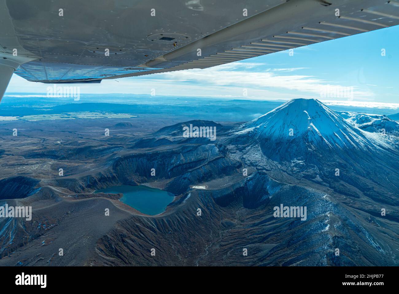 Scenic flight around Mount Ngauruhoe in Tongariro National Park - New Zealand. Stock Photo