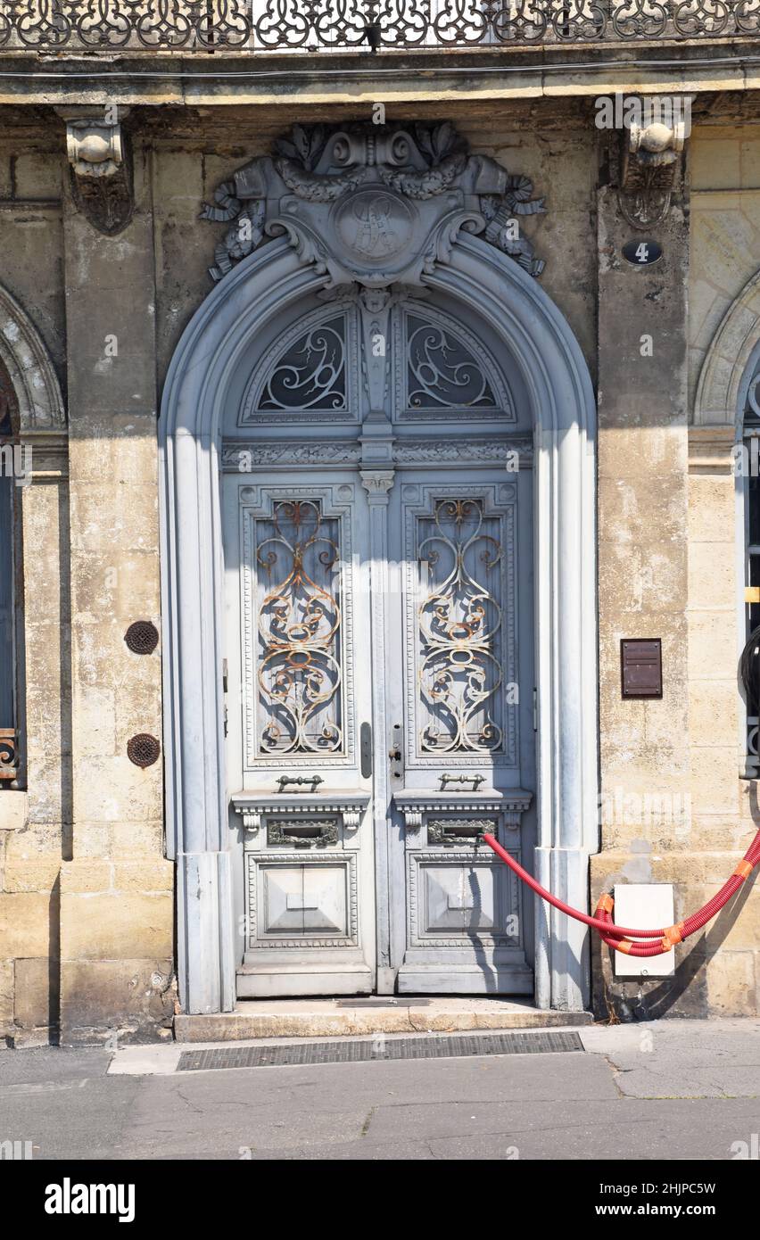 A grand, mid 19th C, three-storey house on the Bastide, right bank of the Garonne in Bordeaux in the preliminary stages of refurbishment Stock Photo