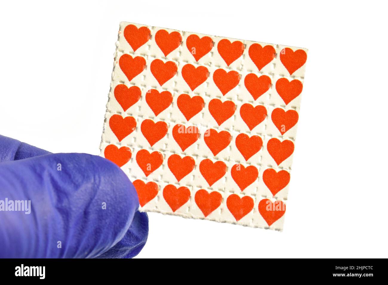 Love hearts acid trips, Blotting paper impregnated with the drug L.S.D. Stock Photo