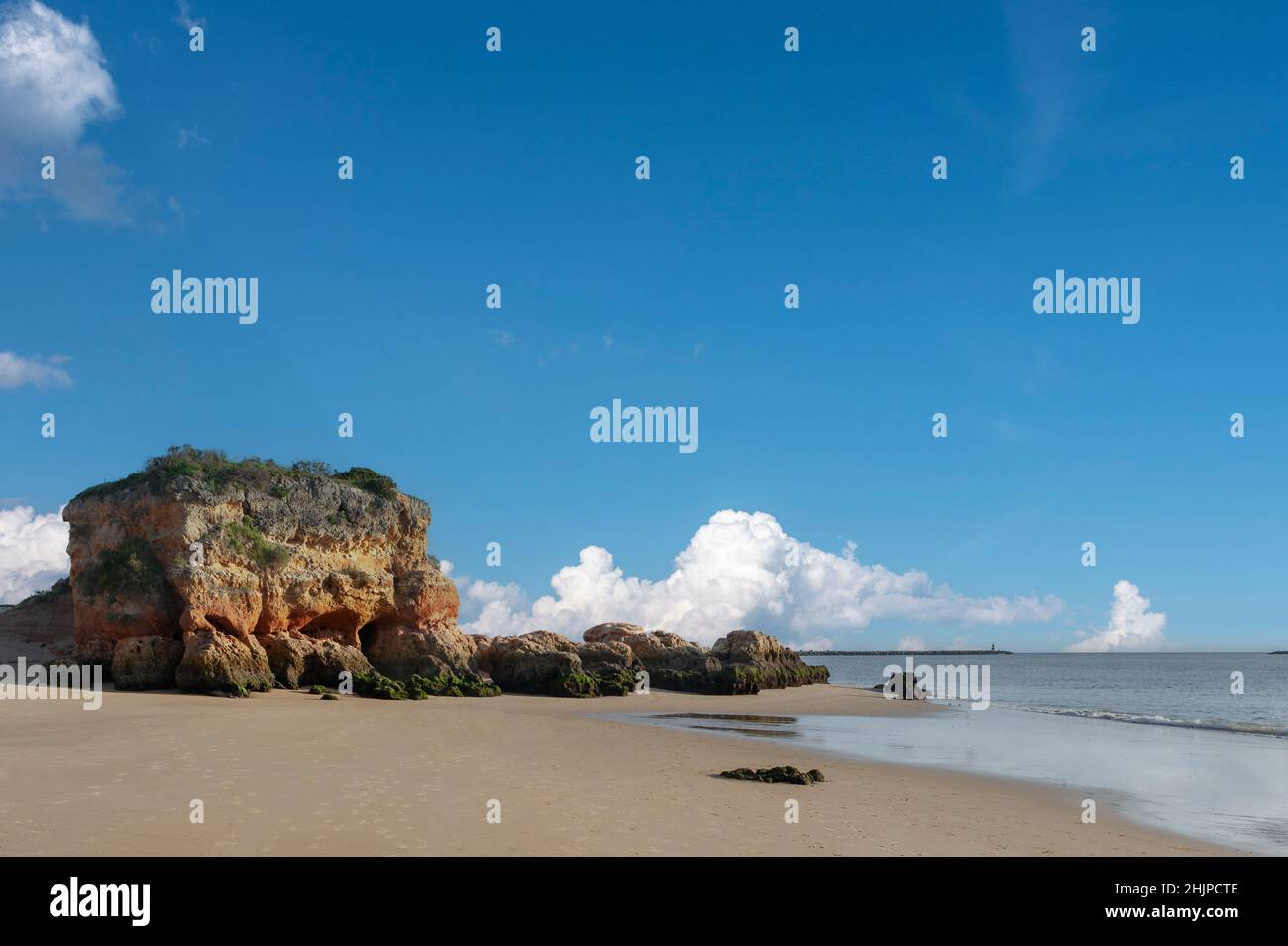 Single standing rock on the beach 'Praia Grande', Ferragudo, Algarve, Portugal, Europe Stock Photo