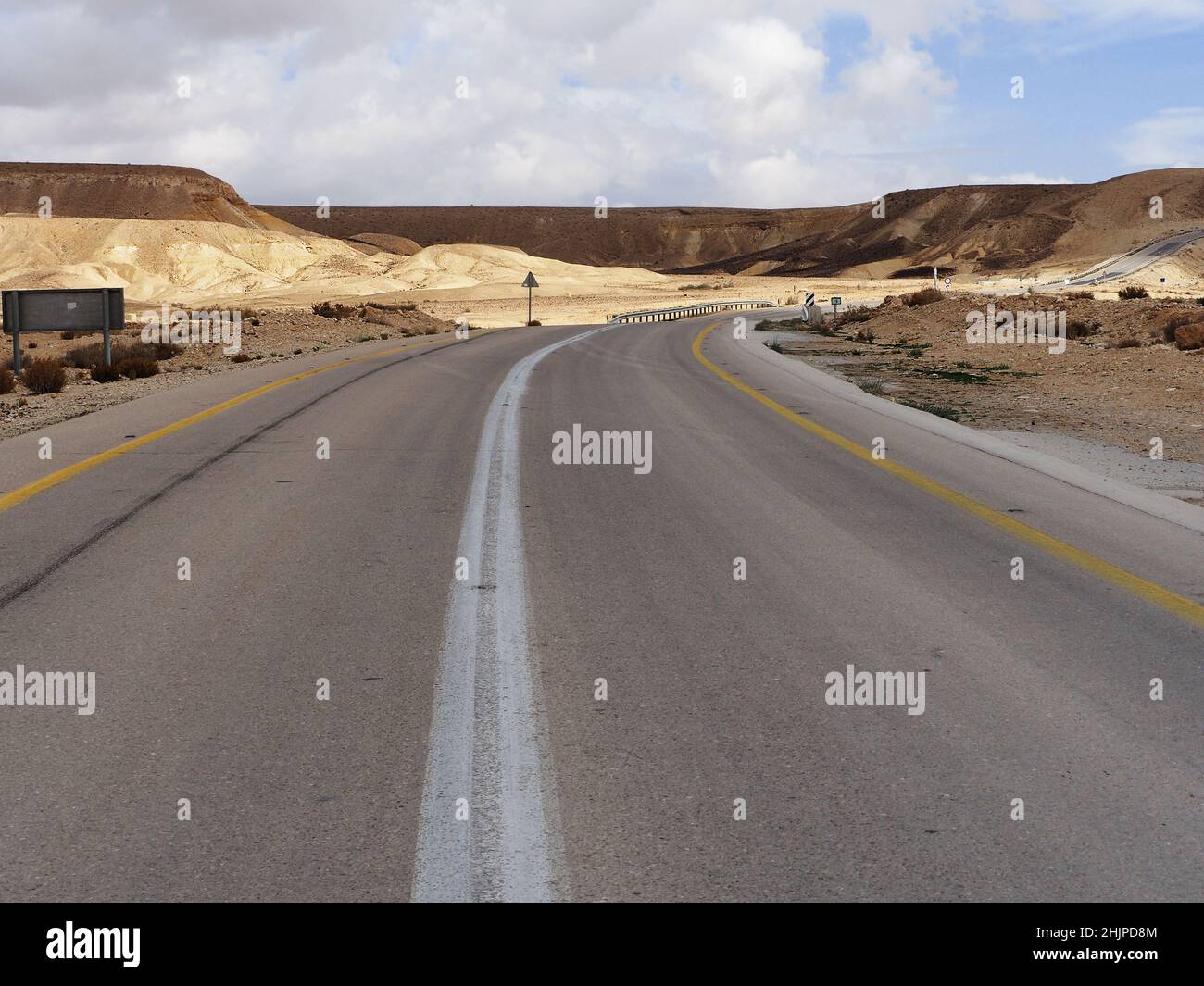 Highway in the Negev desert. Israel. Stock Photo