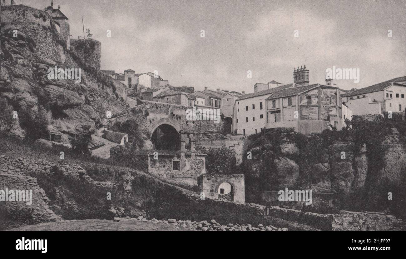 Lower bridge at Rock-Bound Ronda, an Erstwhile favourite stronghold of the Moors. Spain. Andalusia (1923) Stock Photo