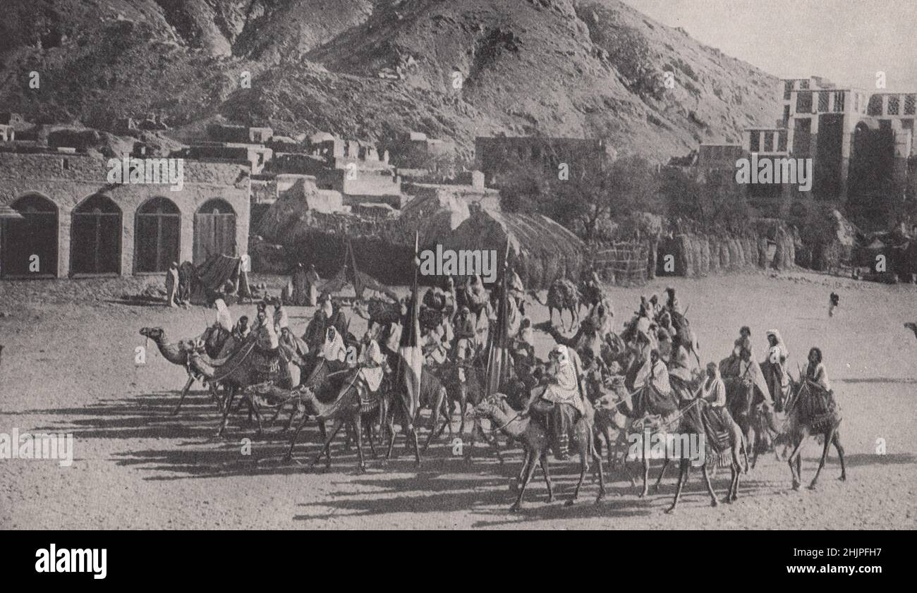 Squadron of the Beduin Camel corps in full Array. Arabia (1923) Stock Photo