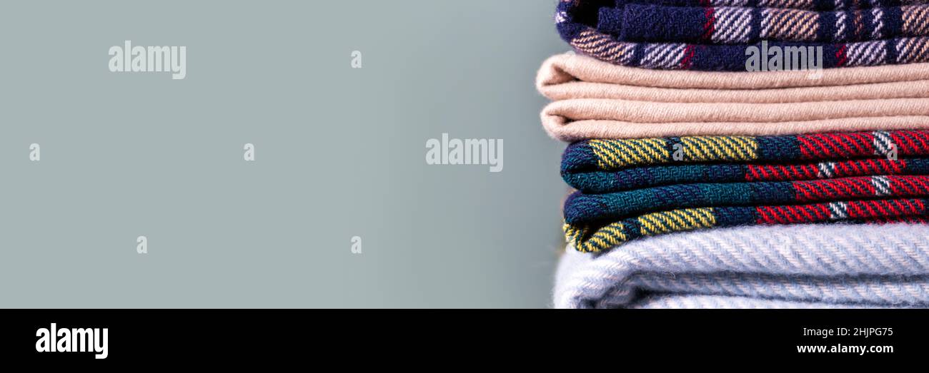 Stack of woolen checked blankets Stock Photo