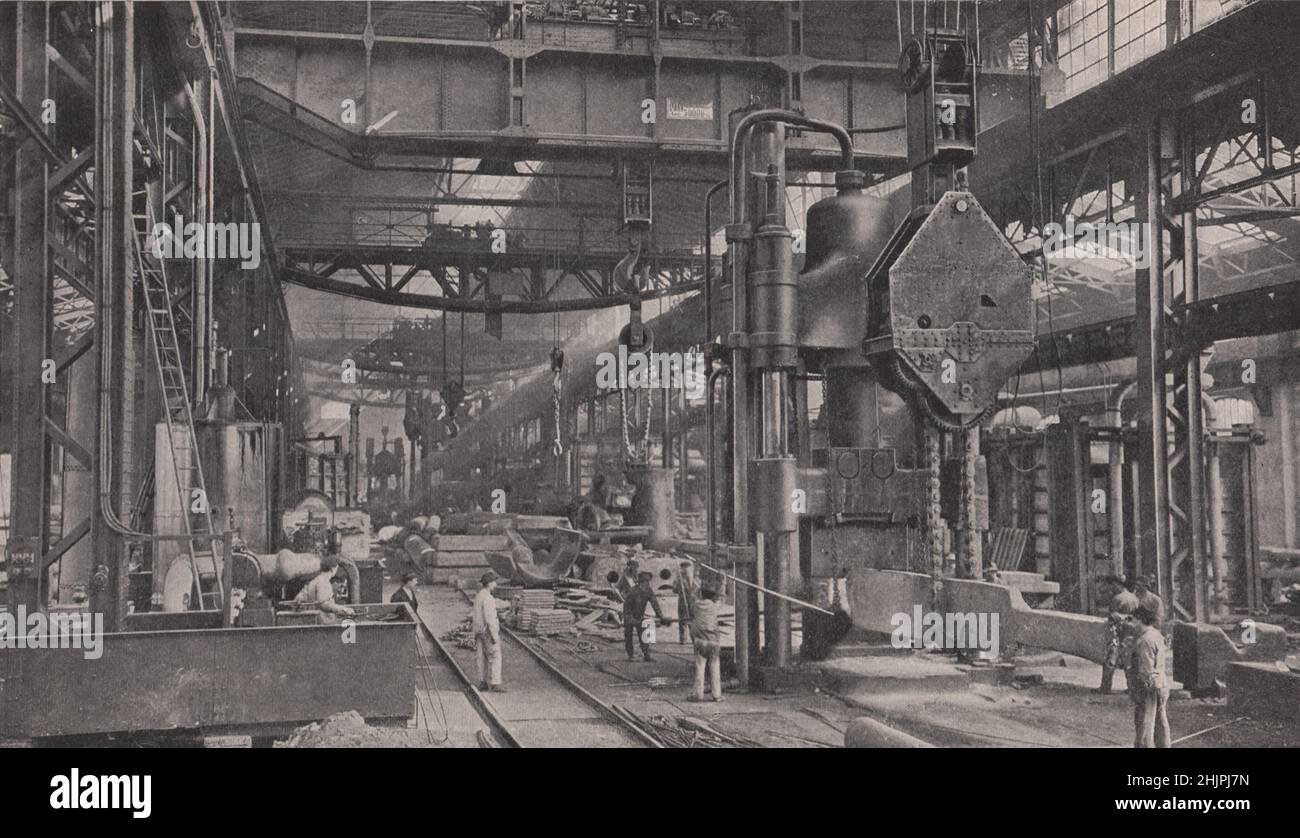 In the heavy forging department of a famous manufacturing firm at Pilsen. Czech Republic. Bohemia (1923) Stock Photo