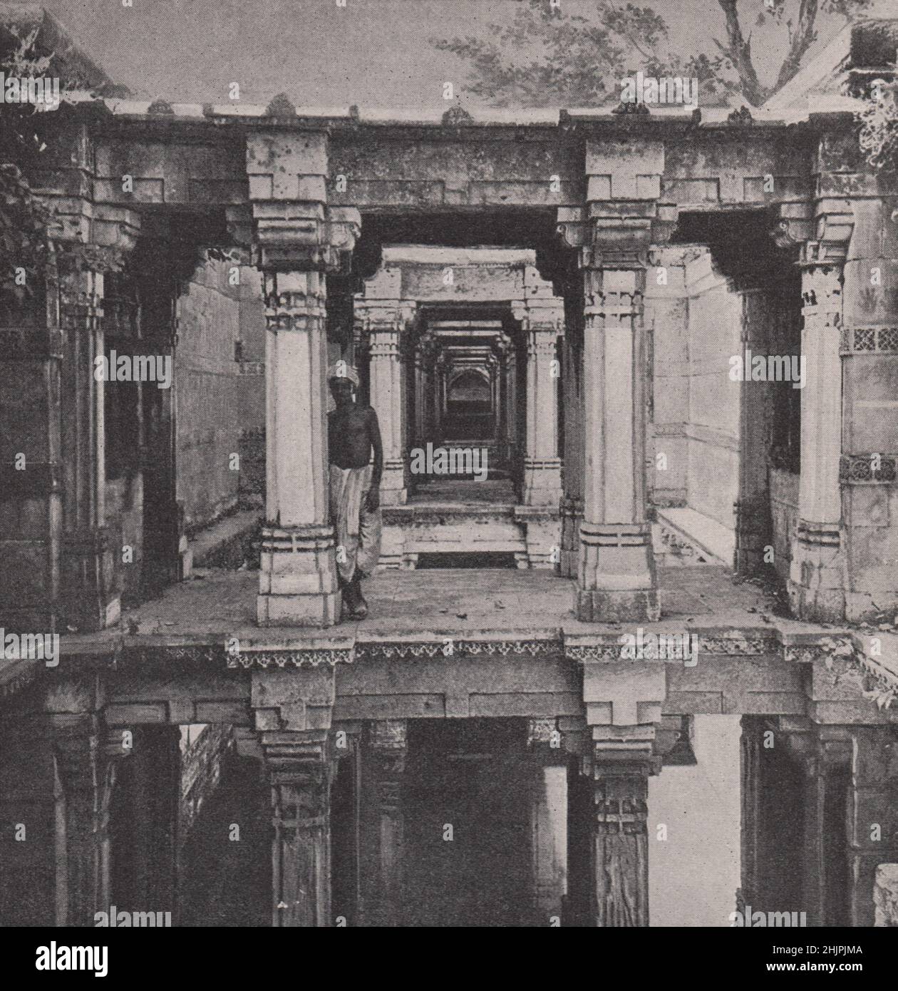 Vista of receding galleries at the wells of dada hari. India. Bombay and Gujarat (1923) Stock Photo