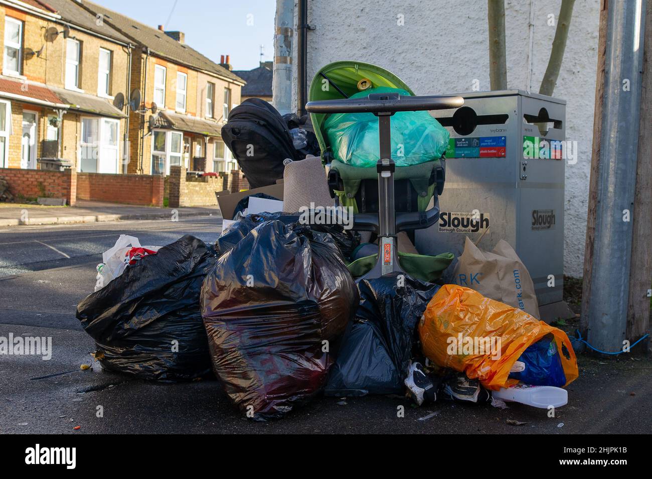 Slough, Berkshire, UK. 31st January, 2022. New figures from the Department for Environment, Food and Rural Affairs (Defra) state that there were 10,547 incidents of fly tipping in Berkshire between 2020 and 2021. Residents continue to fly tip rubbish in Chalvey, Slough despite the area being under surveillance and clear warning signs of fines of up £50,000 or 12 months imprisonment for those convicted of fly tipping. Ironcially Chalvey has a huge free public waste tip for household waste. Credit: Maureen McLean/Alamy Live News Stock Photo