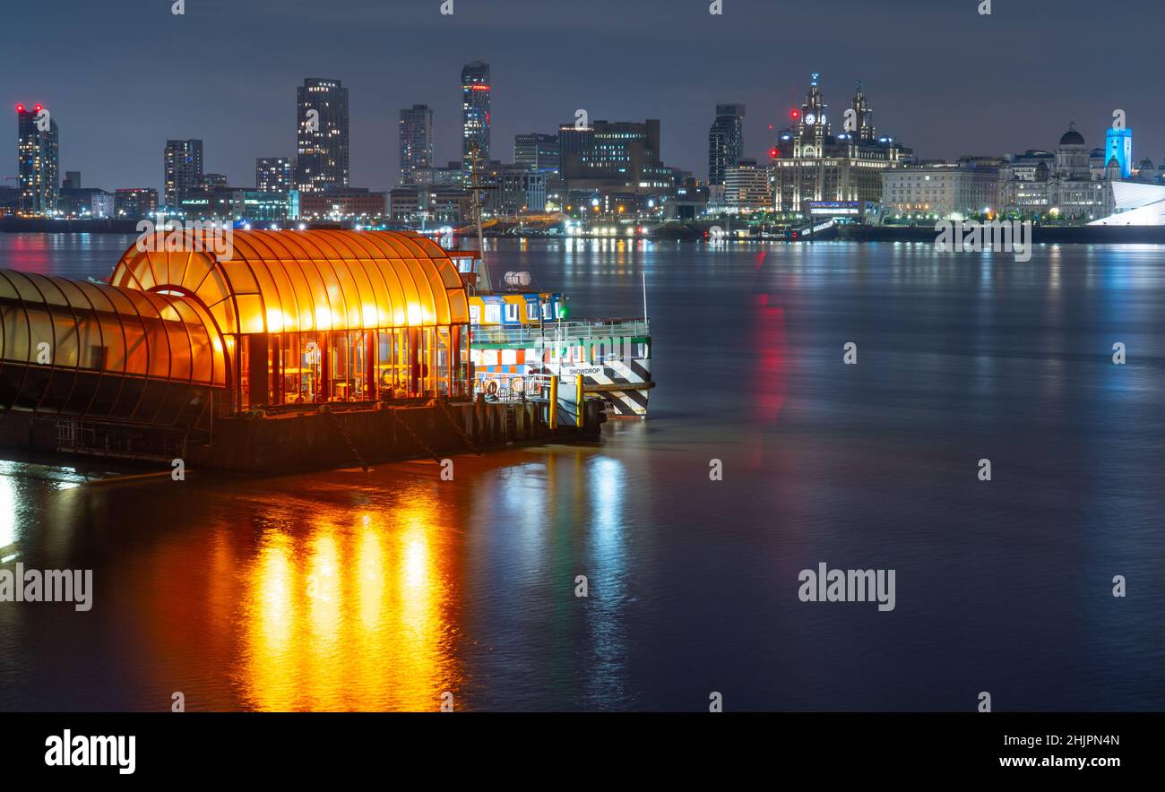 The Snowdrop Ferry parked up on the Birkenhead side of the River Mersey, with the famous Liverpool Waterfront on the otherside. September 2021. Stock Photo