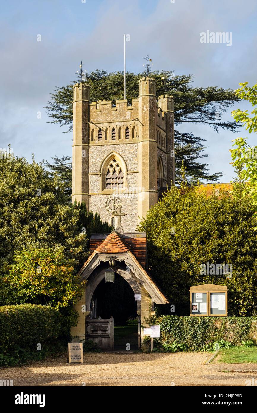 14th century St Mary the Virgin church tower and entrance gate in historic Chilterns village. Hambleden, Buckinghamshire, England, UK, Britain Stock Photo
