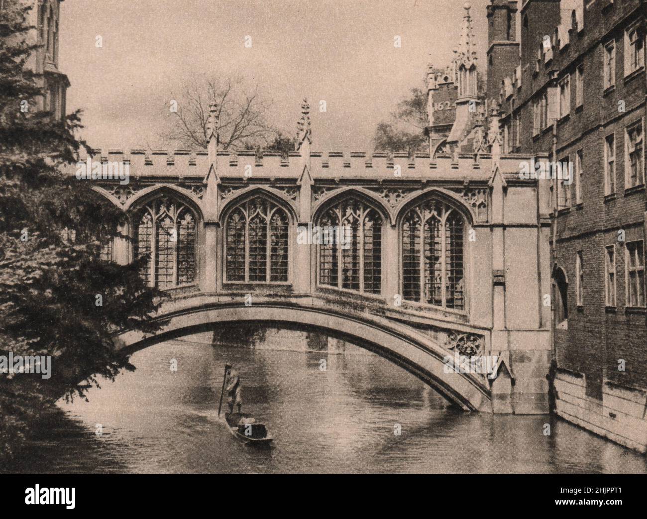 This bridge over the Cam, called the 'Bridge of Sighs'  joins two courts of St. John's College. Cambridge (1923) Stock Photo