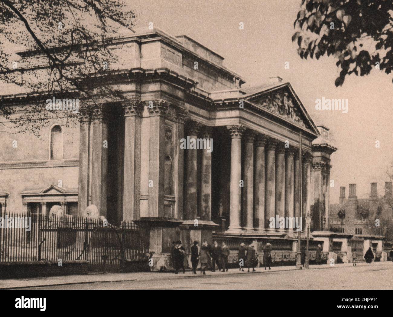 Southward of Peterhouse, whose twisted chimneys appear to the right, is Fitzwilliam Museum, that contains much valuable painting. Cambridge (1923) Stock Photo