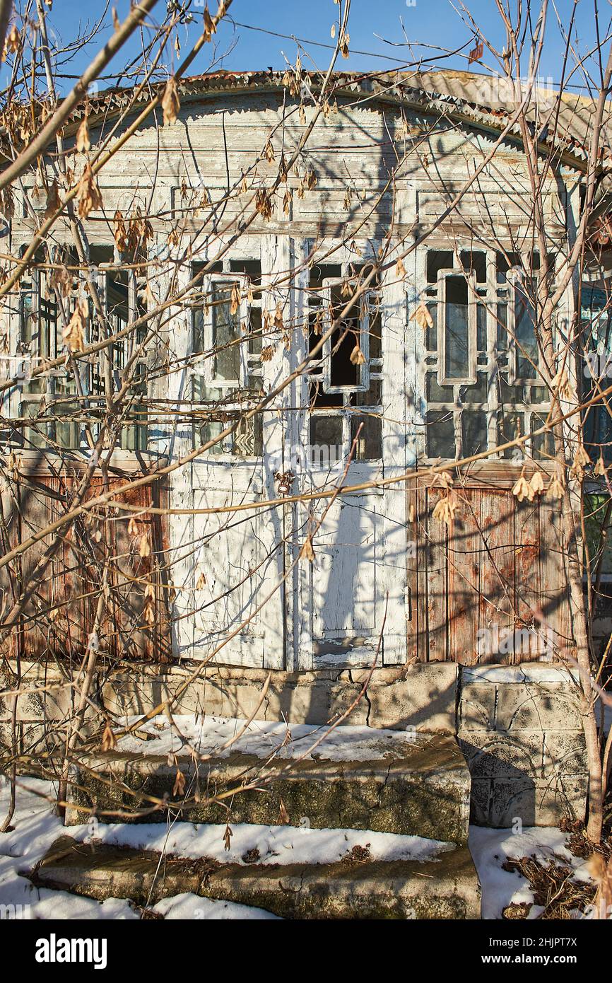 Old abandoned house in village on natural background. Old traditional ...