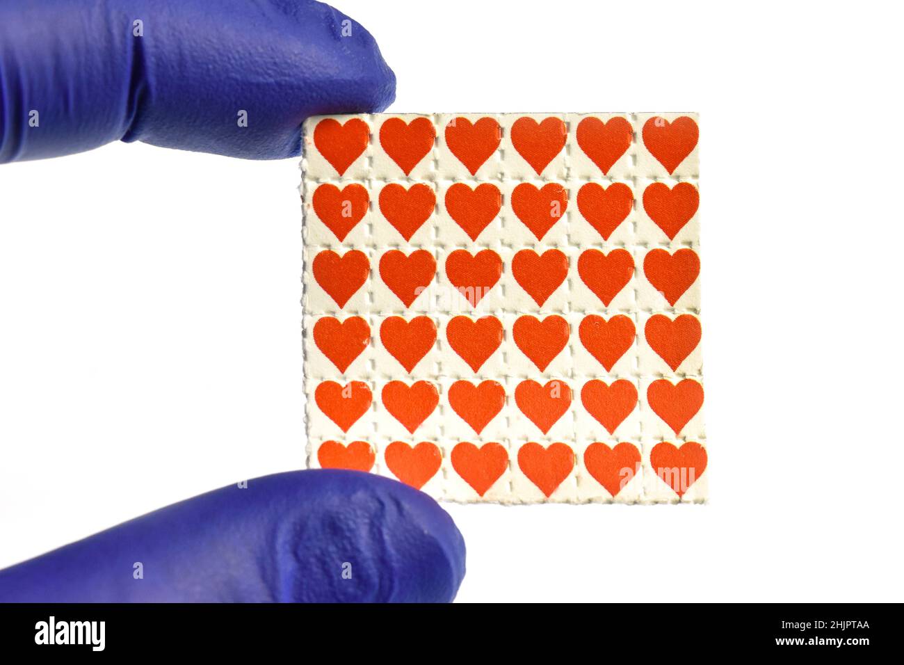 Love hearts acid trips, Blotting paper impregnated with the drug L.S.D.- Lysergic acid diethylamide. Stock Photo