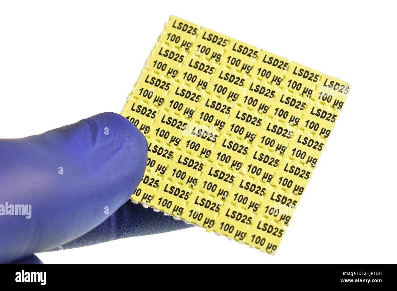 Acid trips, Blotting paper impregnated with the drug L.S.D.- Lysergic acid diethylamide. Stock Photo