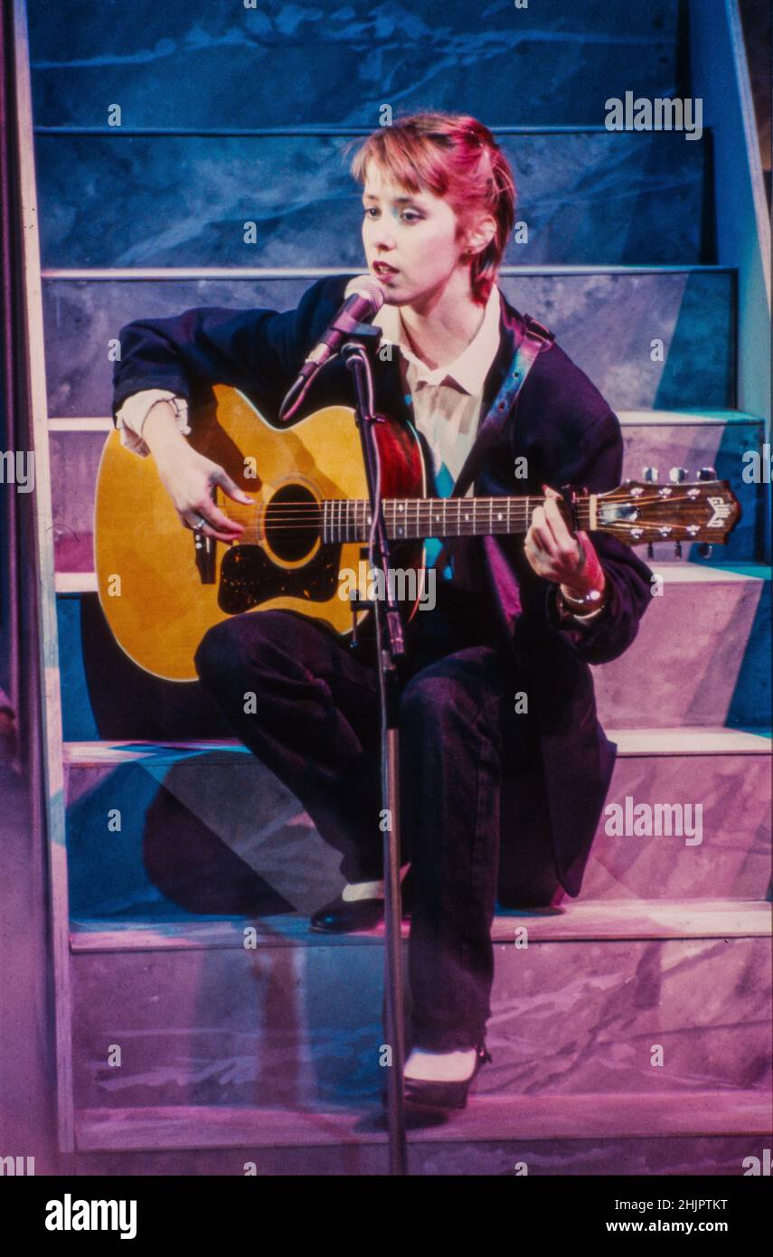 HILVERSUM, THE NETHERLANDS - NOV 06, 1985: American singer-songwriter Suzanne Vega performing on dutch television. Stock Photo