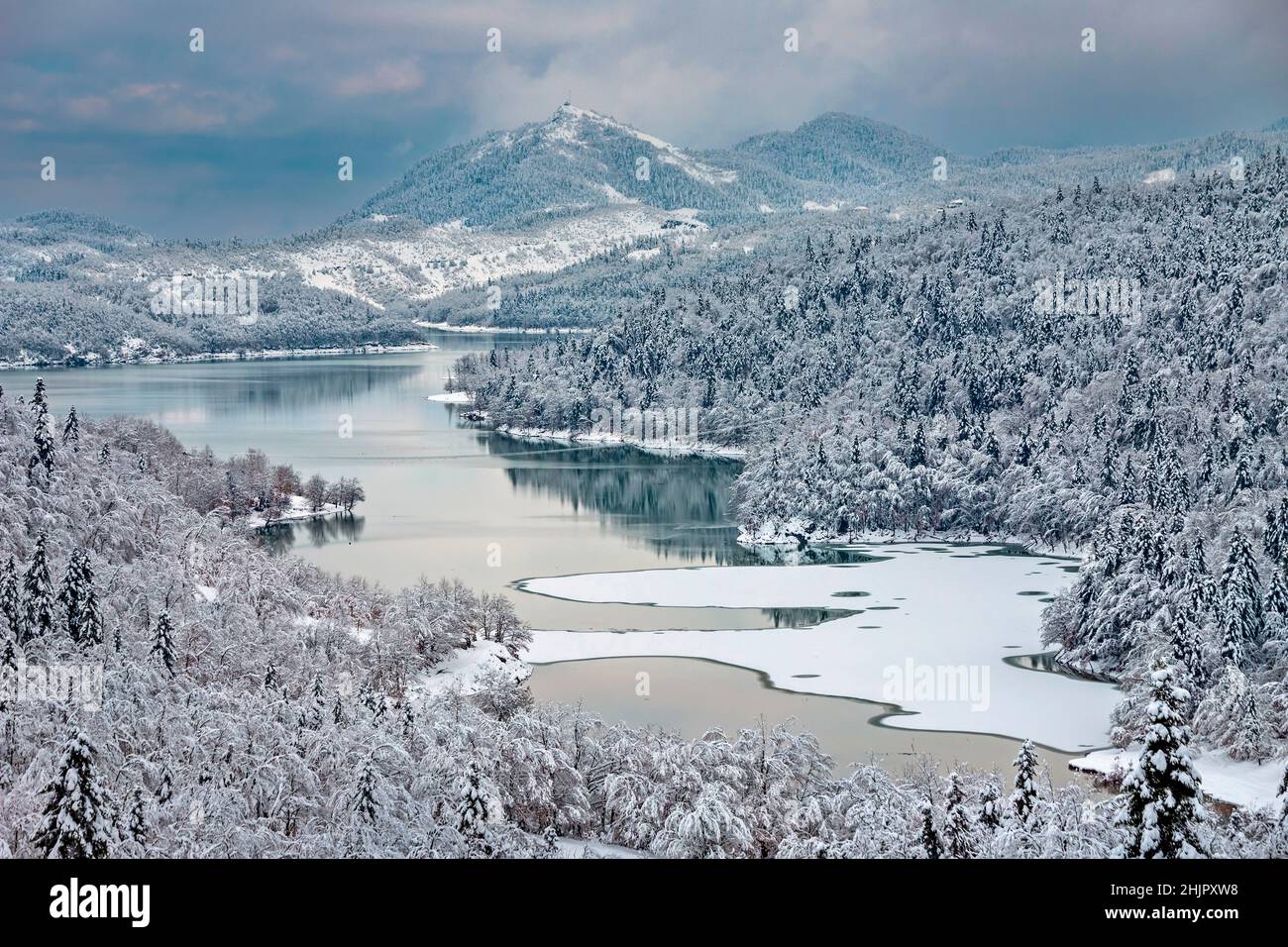 Snowy landscape in Plastiras lake, Agrafa mountains, Karditsa, Thessaly, Greec. Stock Photo