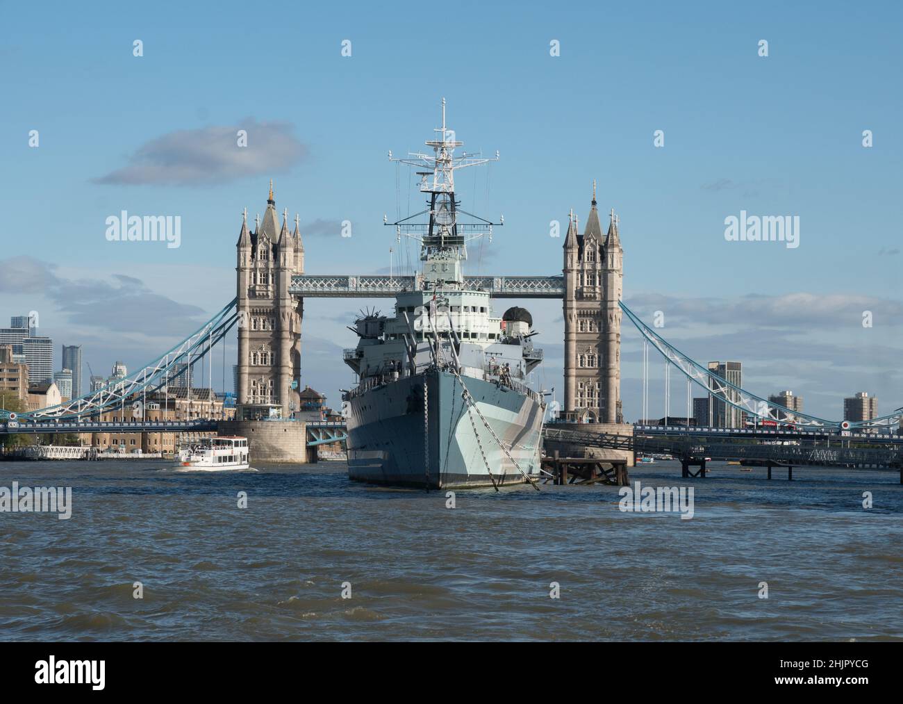 HMS Belfast Moored Near Tower Bridge On The River Thames London Stock hms-belfast-moored-near-tower-bridge-on-the-river-thames-london-stock