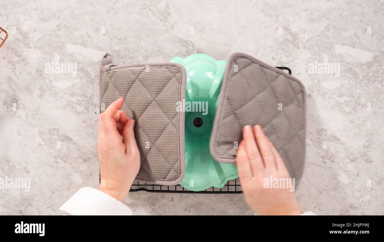 Flat lay. Step by step. Removing freshly baked funfettti bundt cake