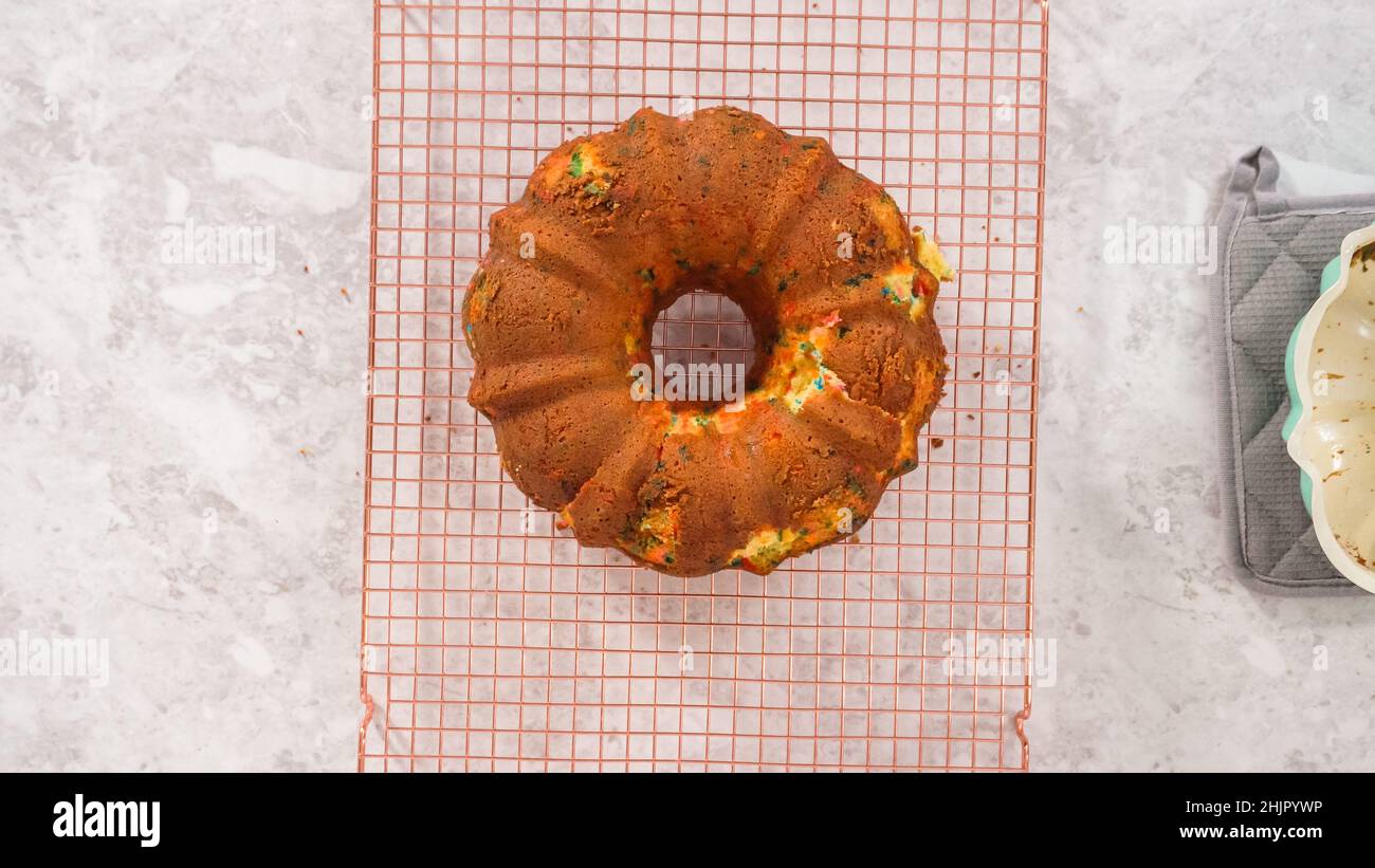Flat lay. Step by step. Removing freshly baked funfettti bundt cake
