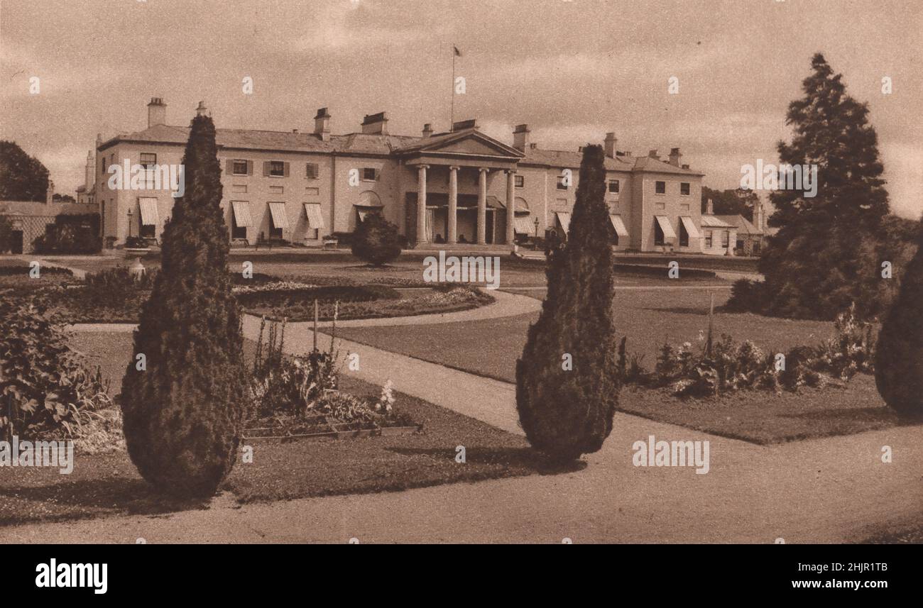 Phoenix Park. On the right side of the main avenue is the former Viceregal Lodge. Ireland. Dublin (1923) Stock Photo