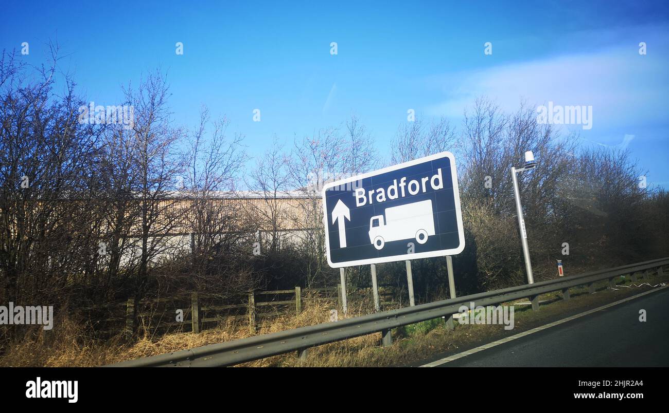 Bradford road sign on the M62 in West Yorkshire, England directing HGV