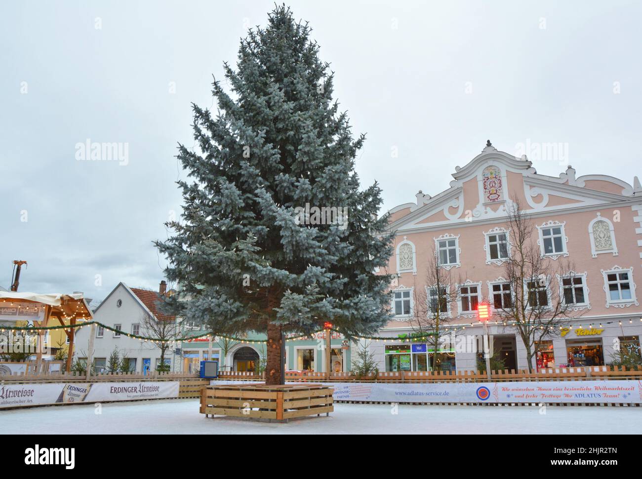 Erding, Germany - November 28, 2017: Ice rink and Christmas tree at Christmas market in Erding town in Germany. Stock Photo