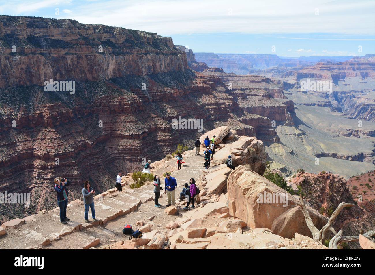 Grand Canyon Village, USA - MARCH 25, 2018 : Tourists in Grand Canyon National Park on South Kaibab trail at Ooh Aah Point. Spring time. Stock Photo