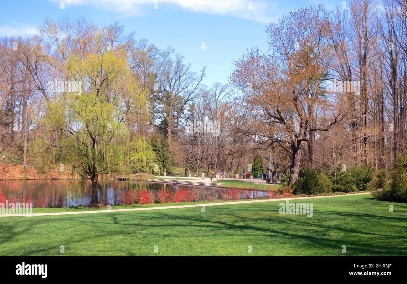 Longwood Gardens, Kennett Square,  Pennsylvania,USA. Walk around the lake with reflections in the spring. Stock Photo