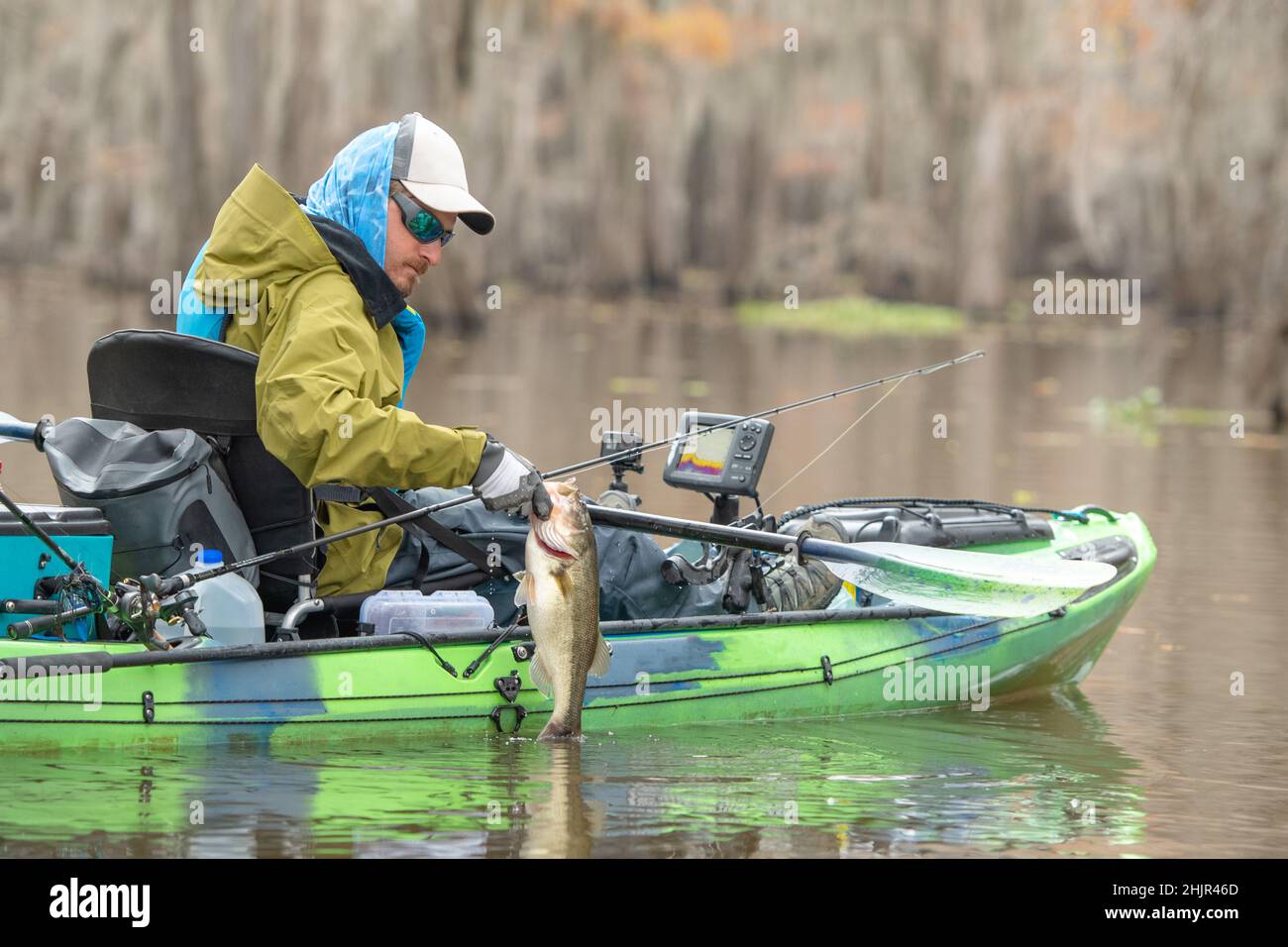 Man Getting Fish Man catching fish in hi-res stock photography and images - Alamy
