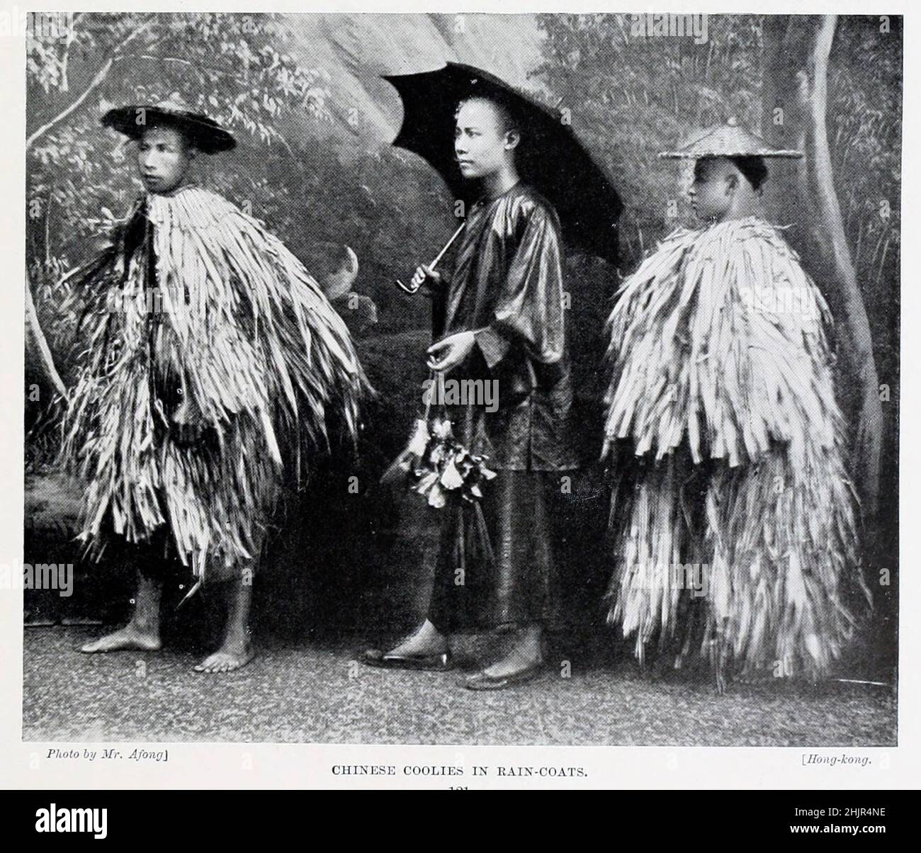 Chinese coolies [(ethnic slur) an offensive name for an unskilled Asian labourer] in rain-coats from the book '  The living races of mankind ' Vol 1 by Henry Neville Hutchinson,, editors John Walter Gregory, and Richard Lydekker, Publisher: London,  Hutchinson & co 1901 Stock Photo