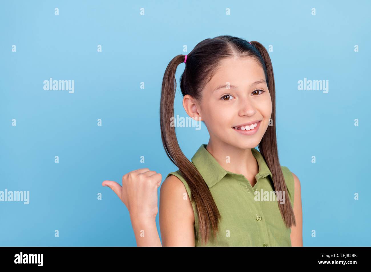 Photo of cheerful cute person direct thumb empty space news tips ...