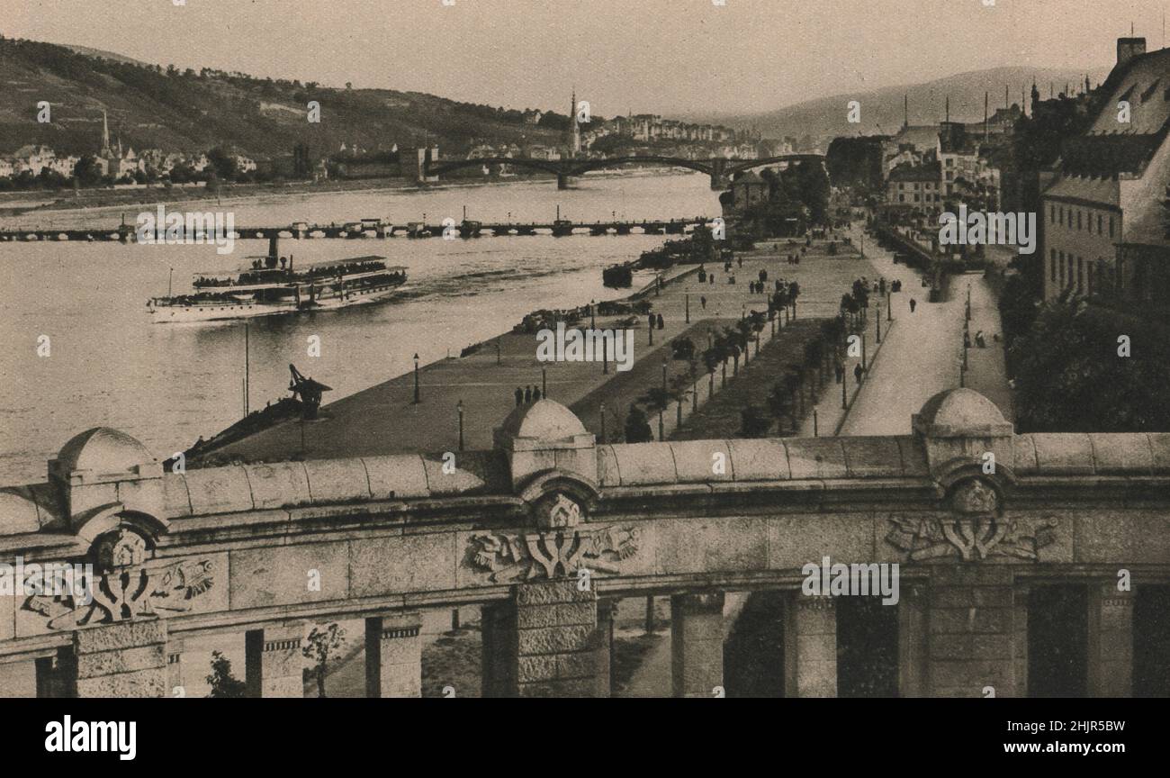 Coblenz. View from the William I. Monument over the Rhine, its broad quay & notable bridge of boats. Germany (1923) Stock Photo
