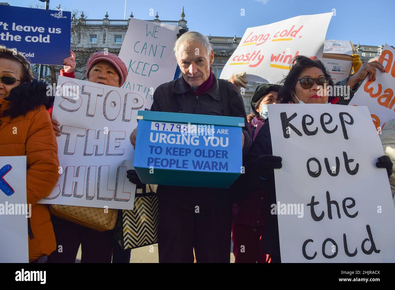 London, UK 31st January 2022. Charity organisation Age UK were joined by supporters outside Downing Street as they delivered a letter to Boris Johnson signed by over 97700 people, urging the government to help elderly people with their energy bills. One million older people live in fuel poverty and are unable to afford the cost of heating during winter. Credit: Vuk Valcic / Alamy Live News Stock Photo