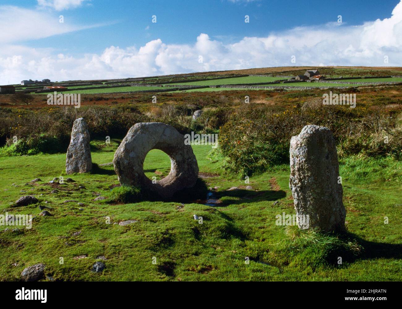 View WNW of Men an Tol holed stone, Bosullow Common, West Penwith, Cornwall, England, UK, associated with folklore, healing rituals and divination. Stock Photo