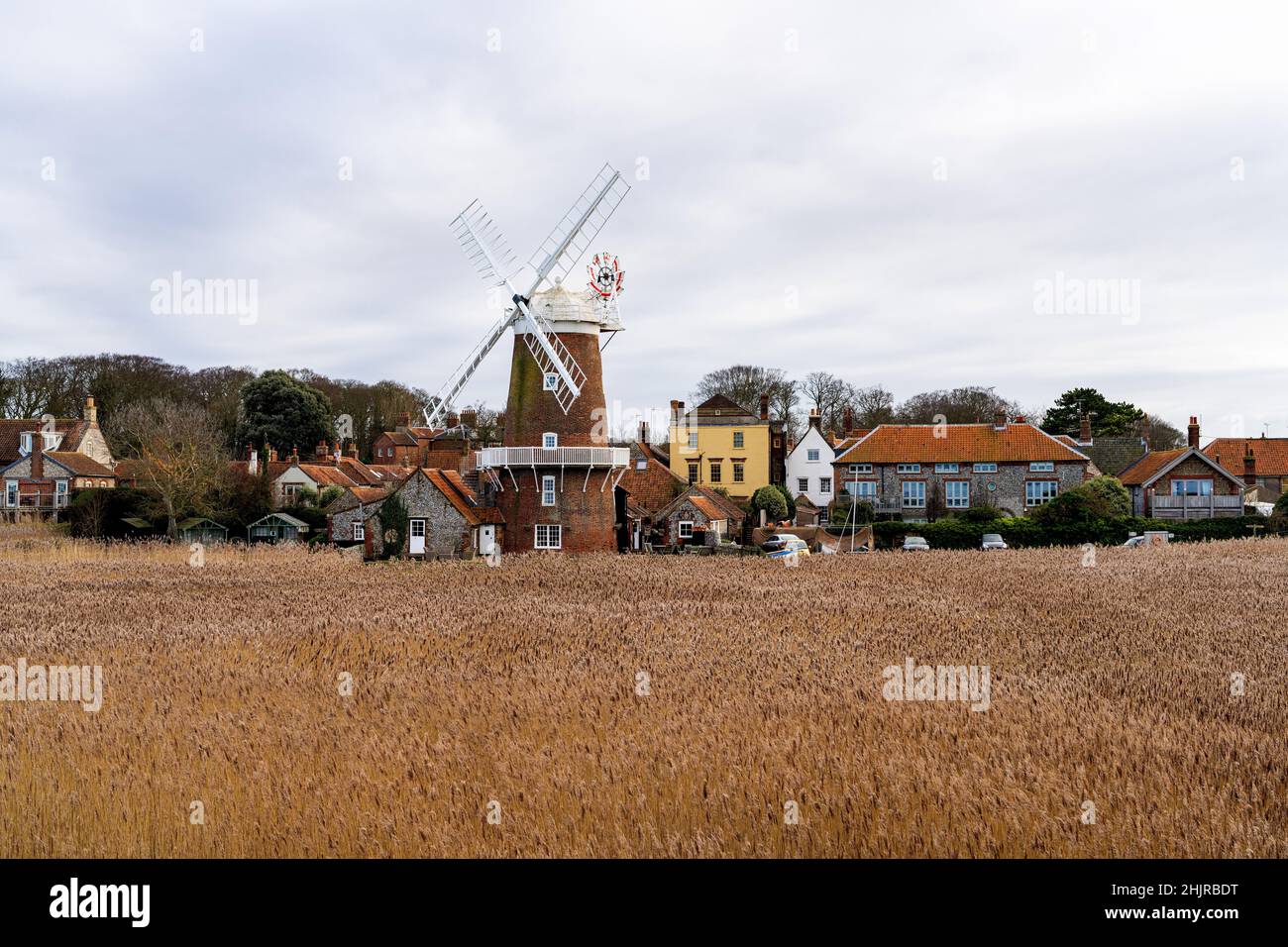 The windmill and marshes at Cley Next the Sea in North Norfolk, UK Stock Photo