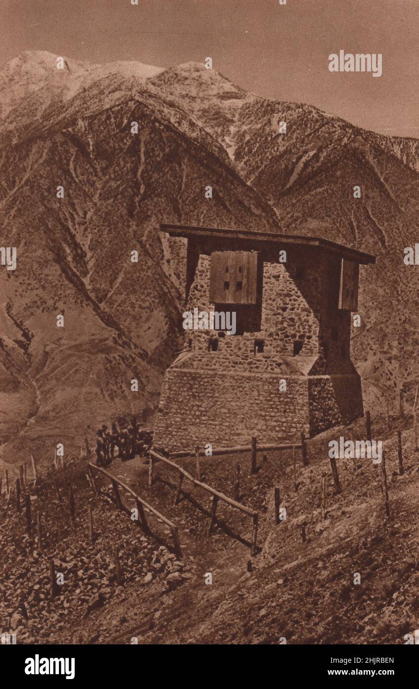 Machicolated Galleries for downward fire, barbed wire and Gurkha garrison keep the block-house against Chitralis. Nepal (1923) Stock Photo