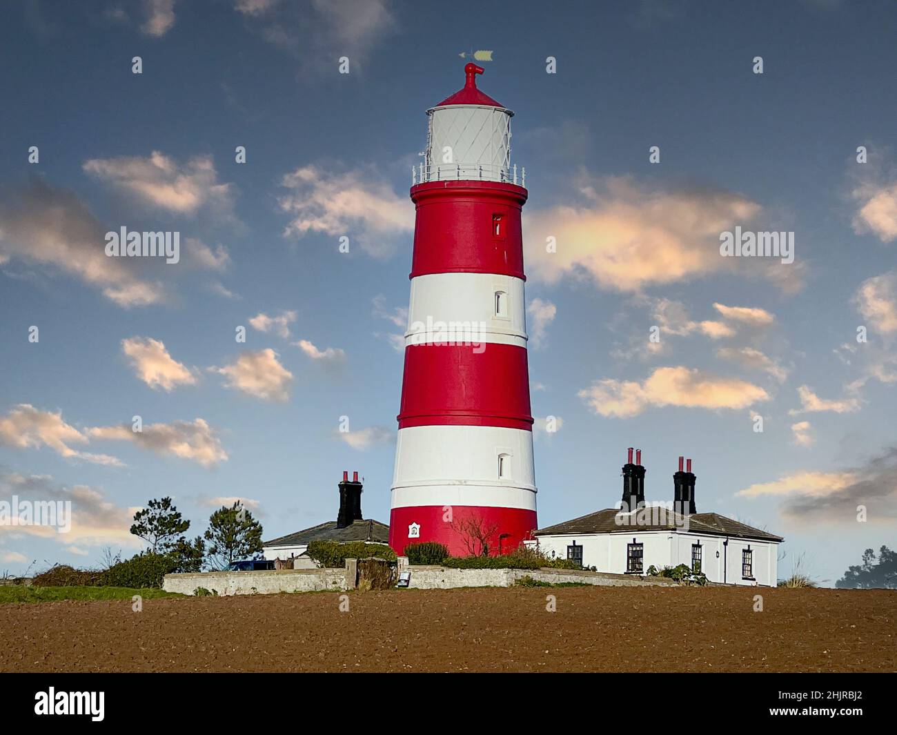 Happisburgh lighthouse in Norfolk, England, UK at dawn Stock Photo