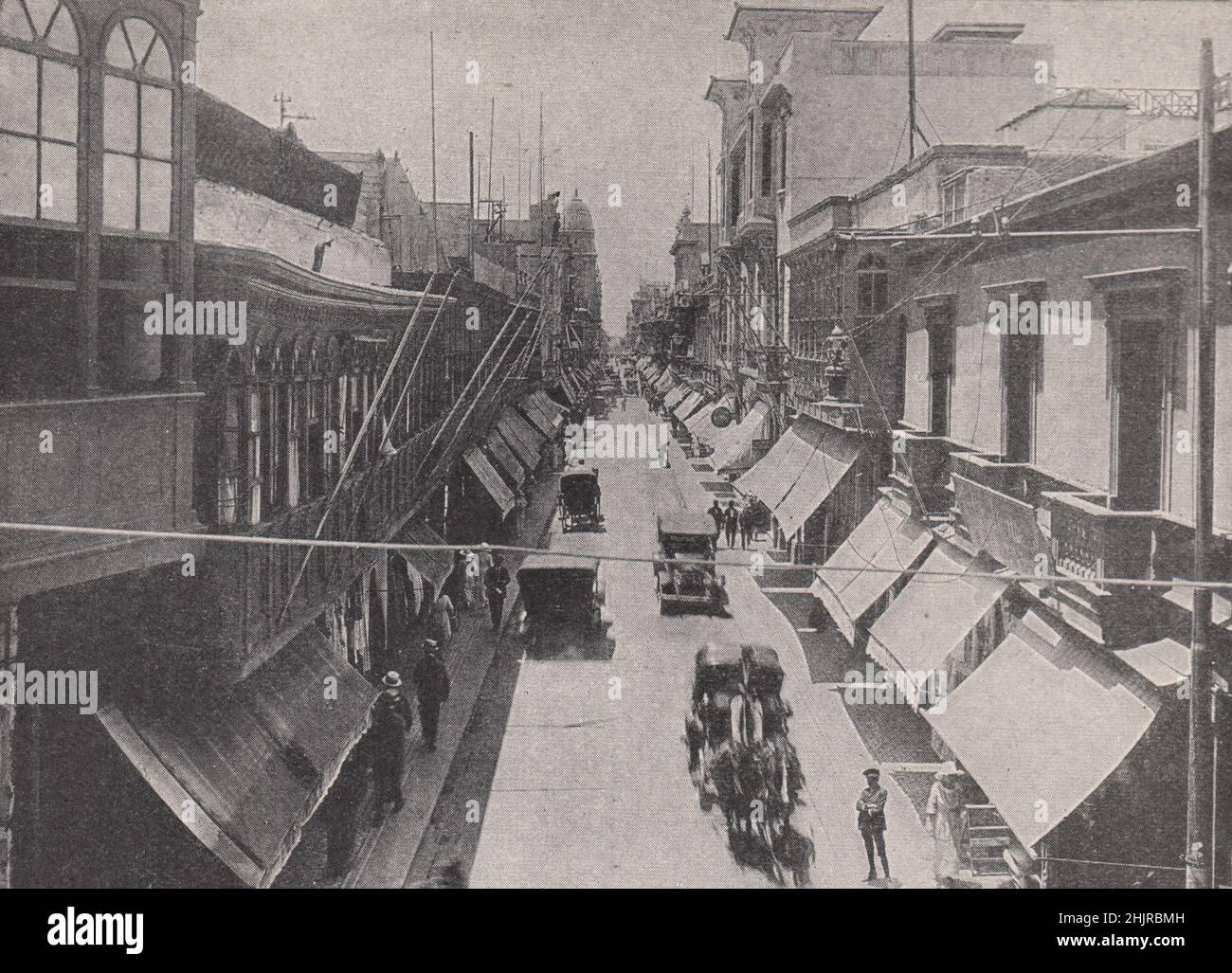 Calle del Mercado, the main business Street of lima. Peru. Lima (1923) Stock Photo