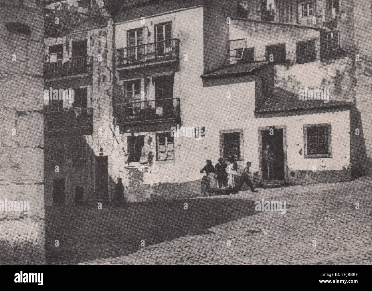 Cobbled largo de Santo Estevao in the east end of Lisbon. Portugal (1923) Stock Photo