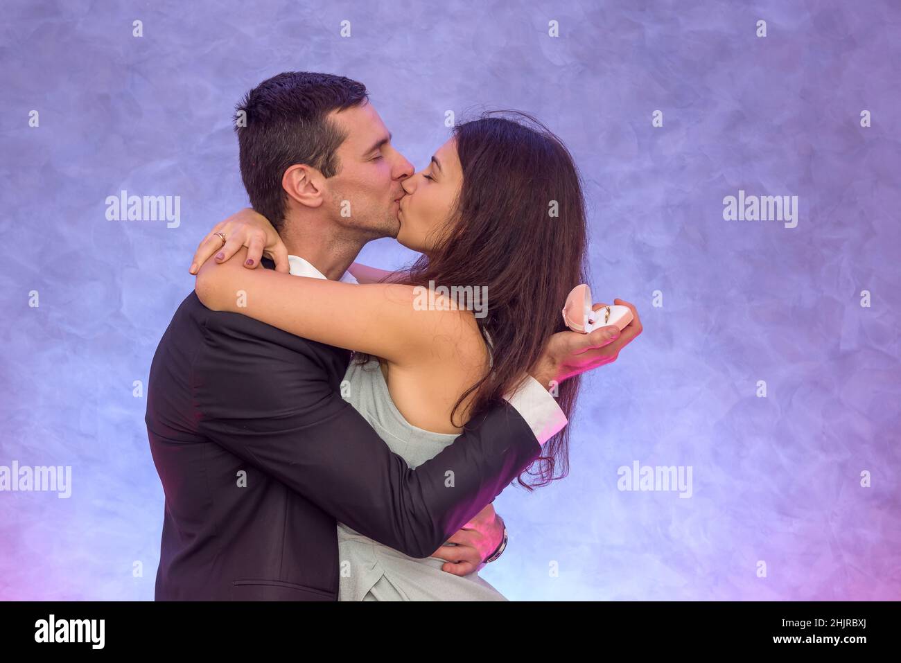 Happy couple. Woman kissing her husband. Love and tenderness. Happy Valentines day Stock Photo
