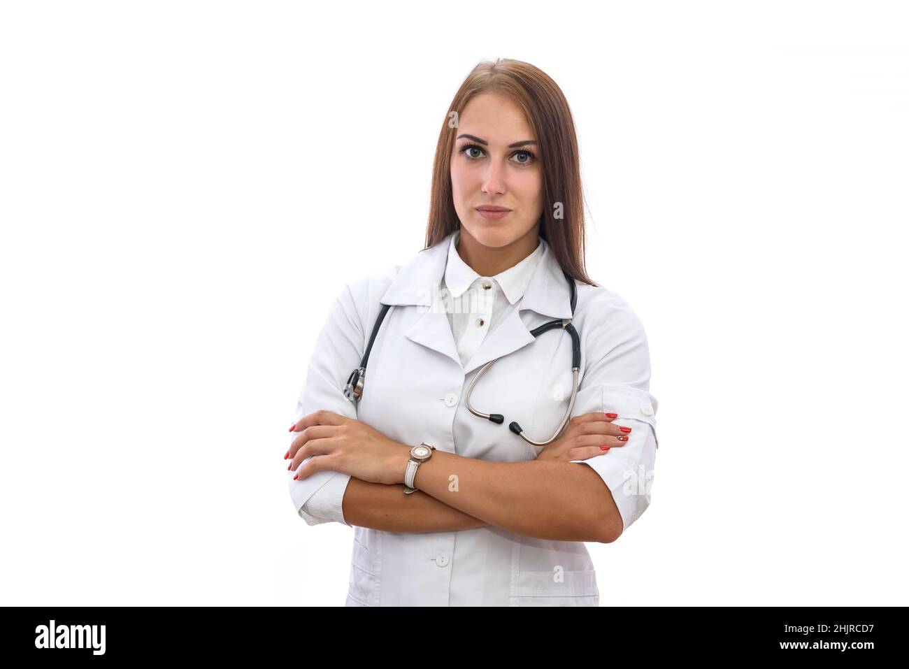 Medical worker. Beautiful woman in medical coat posing isolated on white background Stock Photo