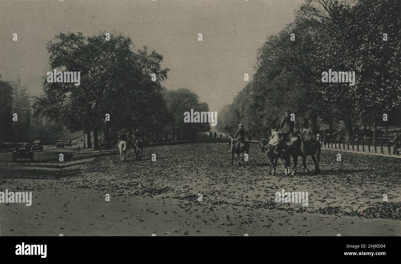 Hyde Park was used for horse-racing in the time of Charles II along the Route du Roi, corrupted into Rotten Row. London (1923) Stock Photo