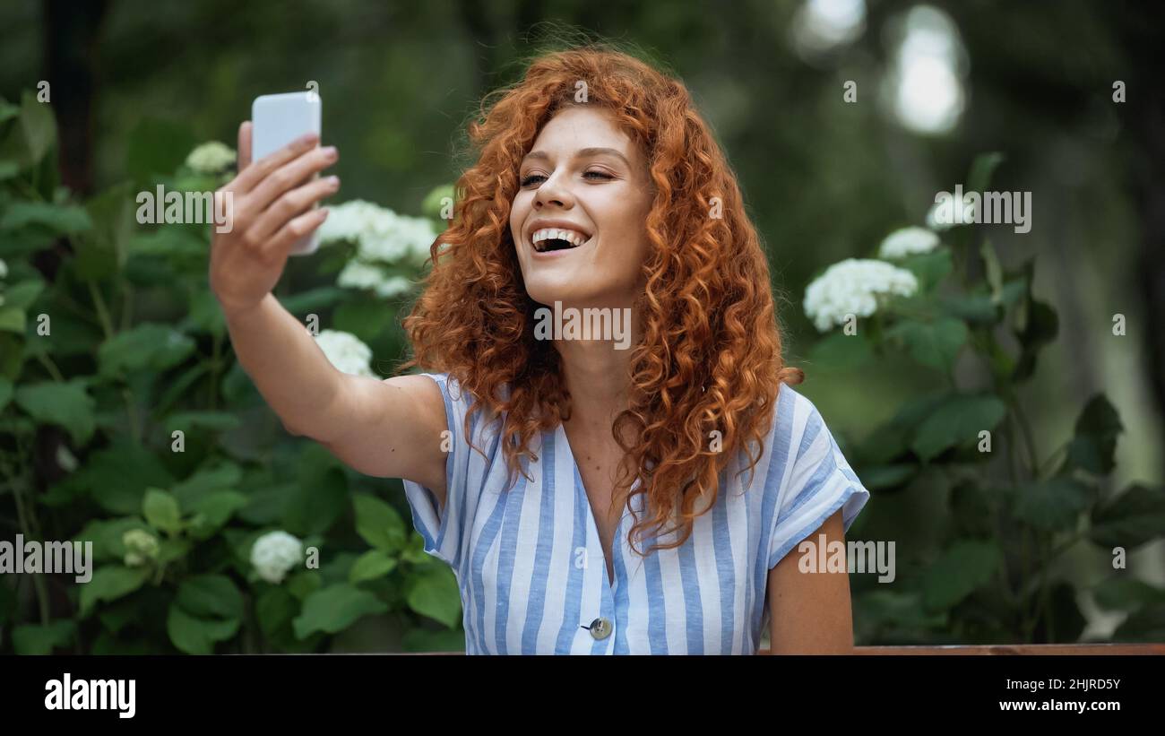 Smiling redhead woman taking hi-res stock photography and images - Alamy