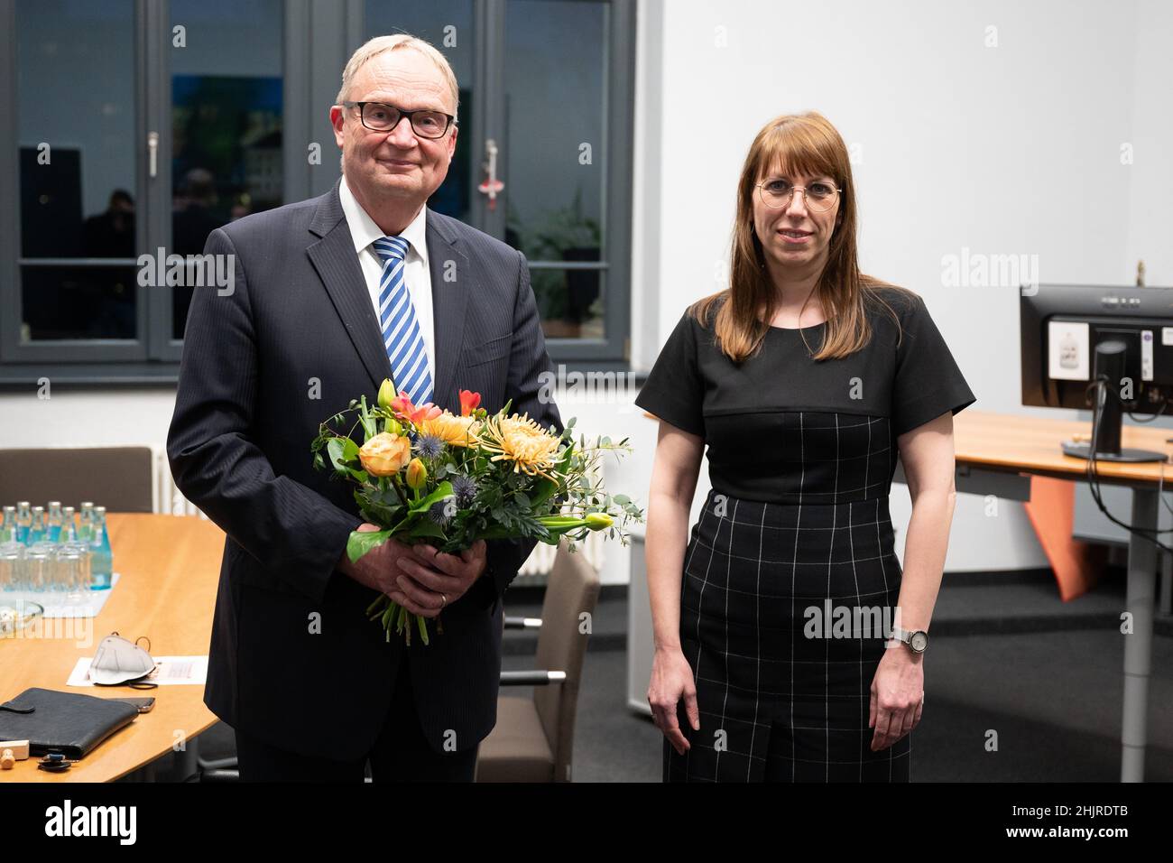 Dresden, Germany. 31st Jan, 2022. Katja Meier (Bündnis90/Die Grünen),  Minister of Justice of Saxony, stands next to the future Attorney General  Martin Übele during the handover of office at the Dresden Justice
